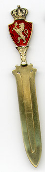 This bookmark was made in Norway by David Andersen. It is marked 925 and the makers hallmark. The top has a shield of red enamel with a lion passant and a crown on top. It is finished in a gold wash. The date is 1910 - 1920.