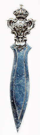 This bookmark was made in Portugal by an unknown manufacturer. The top has a crown and shield. The date is 1970 - 1980.
