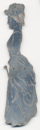 This bookmark was made in the US by J. F. Fradley & Co., a small New York silver manufacturer in business from 1870 - 1936. It is in the shape of a woman, Dolly Varden, from the Charles Dickens book. It is marked Sterling, the cross hallmark, 1863 and 71. Also inscribed on the back is "Dolly Varden". Date is 1890 - 1936.