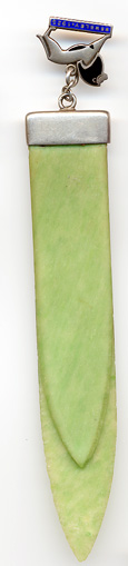  This bookmark is made of green celluloid and sterling silver. It is marked sterling silver and has a Patent number 212101. It was patented on March 2, 1923 by A. J. Smith of Variety Works, Fredrick Street, Birmingham, England. The top is a silver and enamel lion with the words Wembley - 1925.    