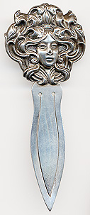  This bookmark was made in the US by an unknown manufacturer. It is marked sterling. The top is an art nouveau lady head  