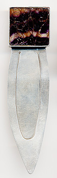  This bookmark was made in Sheffield, England. It is marked with the makers mark and the hallmarks for Sheffield and the year 1988. The top is an inlaid piece of brown quartz.  