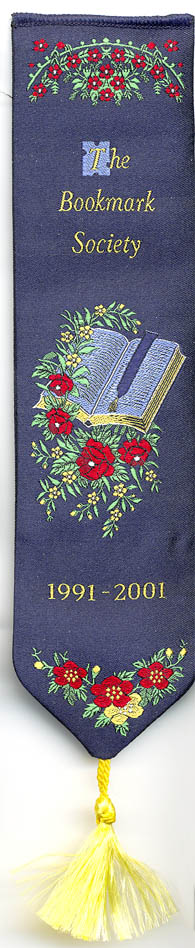 This is a woven silk bookmark made in Great Britain by Halon Gifts, Chester England. It is was made for the Bookmark Society in 2001. The package it came in says "Over 3000 Silk Threads Have Been Intricately Woven To Create This Charming Silk Bookmark Reminiscent Of Those First Produced In Victorian Times."  