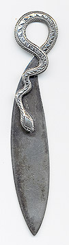  This bookmark was made in the US by an unknown manufacturer. It is only marked sterling on the back. It is figural diamond-back rattlesnake slithering around as the top blade. The date is 1890 - 1910.  