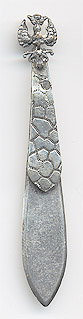  This bookmark was made in France. It is unmarked but is probably silver plate or low grade french silver. A crowned eagle is at the top with the Cross of Larraine at its center. The date is 1890 - 1900. 