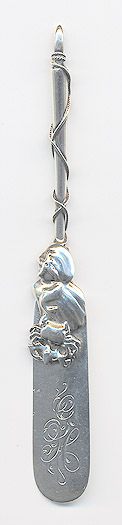  This bookmark was made in the US by Gorham. It is marked with the makers hallmark, sterling and the number 7. The bookmark is in the shape of a paddle with the top blade made of shells, a starfish and a crab. It is one of 33 bookmarks sold in the Autumn 1888 silver catalog.   