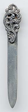  This bookmark was made in the US by La Pierre. It is marked with the manufacturers hallmark and sterling. The top is an art nouveau design which forms the top blade.  