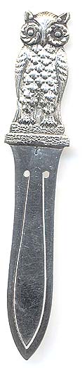  This bookmark was made in Holland by an unknown manufacturer. It is a detailed figural owl. The date is 1920 - 1940.   