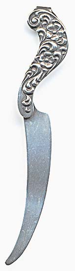  This bookmark was made in the US by Dominick and Haff. It is marked with the makers hallmark and sterling. It is an art nouveau design in the shape of a knife. The date is 1900 - 1910.   