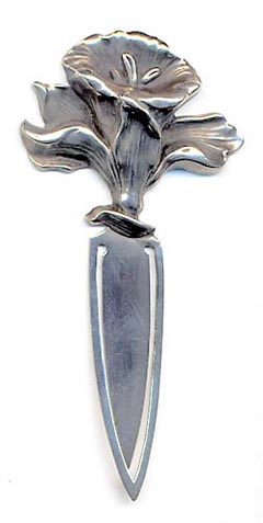  This bookmark was made in the US by William Kerr. It is marked with the makers hallmark and sterling. The top is a figural orchid flower. The date is 1900 - 1910.   