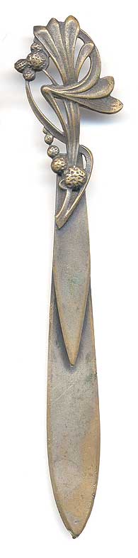 This bookmark was made possibly in Italy or France. It is silver-plated brass and has an art nouveau flower design on the top. The date is 1890 - 1910.   
