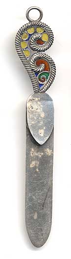  This bookmark was made in the US by an unknown manufacturer. It is marked sterling on the back and has a colored plique-a-jour enamel design on the top. The date is 1900 - 1910.   