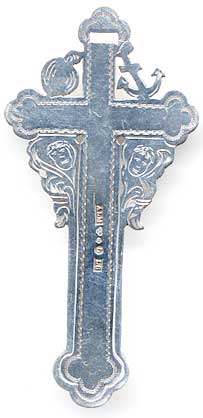  This bookmark was made in Sweden by a manufacturer whose hallmark is ALM. It is marked with Swedish hallmarks that include the state mark, city mark and the date mark. It is in the shape of a cross with symbols for faith, hope and charity. The date is 1937.   