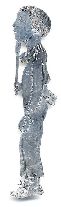 This bookmark was made in the US by J.F. Fradley. It is marked on the back with sterling, the manufacturers hallmark of a cross, the number 7, and Oliver Twist. This is a figure of the Dickens character from the book with the same name. The date is 1890 - 1936. 