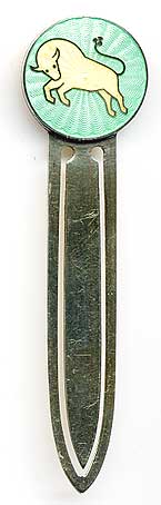  This bookmark was  made in Norway by David Andersen. It is marked sterling on the back.  The top has a yellow enamel bucking bull on a green enamel background.  The date is 1960 - 1980. 