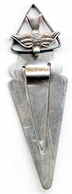  This bookmark was made in and unknown country, possibly somewhere in South America. It is marked on the back with what looks like a rubbed out 925 for sterling but it is not clear. The top is a detailed figural of a flying bird within a triangle. The date is unknown.   
