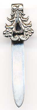  This bookmark was made in the US by Whiting Manufacturing Co. It is marked with the the makers hallmark, sterling and 4672. It is an art nouveau design, folded over to make the top blade.  