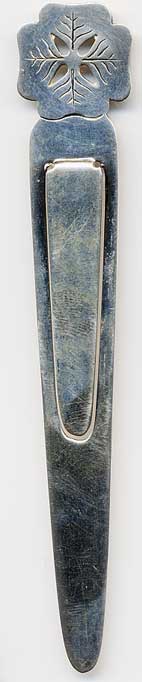 This bookmark is American by Tiffany and Co. It is marked Tiffany and Co. Makers Sterling and the date letter M. The top is a cutout flower design. The date is 1907 - 1947 (directorship of John C. Moore II)
