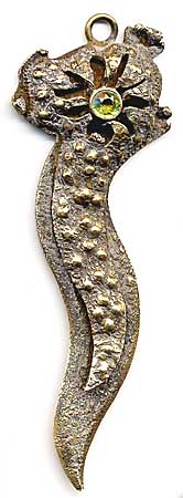  This bookmark is made in the US by Gorham. It is marked sterling, with the makers hallmark and the number 3111 on the back. This is a very strange shape where the top blade has a series of bumps leading up to the top where a light green jewel is set. It is finished in a gold wash.  The date is 1880 - 1910.  