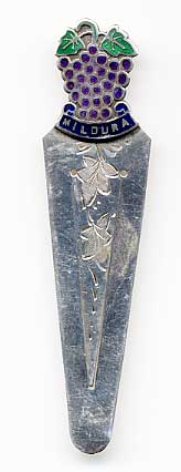  This bookmark is made in Austrailia. It marked Stg Silver with a horse head hallmark. The top is an enamel bunch of grapes and leaves marked Mildura.  The date is 1920 - 1930.  