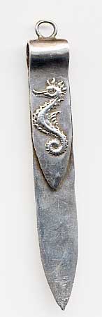  This bookmark is made in the US by Shiebler for Tiffany and Co. It is marked with the Shiebler makers mark and 1923 and Tiffany and Co. The top has a  detailed sea horse. The blades are hand hammered.  The date is 1900 - 1910.  
