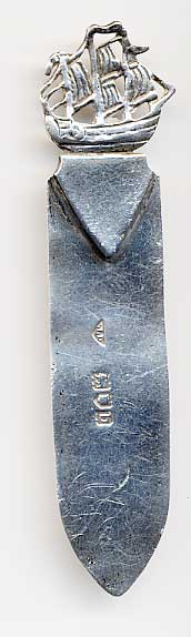  This bookmark is made in London, England. The maker is JD and the hallmarks date this piece to 1897. The top is a figural tall sailing ship with three masts.  The date is 1897.  