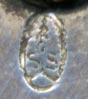 This bookmark is probably European and has a makers hallmark with two letters both 'S'". It has 800 on the handle indicating that it is 800 silver. It also has a pencil inside the handle."
