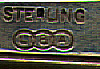 This bookmark is American made by Link and Angell circa 1900 - 1910. It has the makers hallmark and the word Sterling on the back. It has a fleur-de-lis shape on the top.  