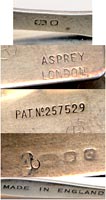 This bookmark was made in London by Asprey. It is a very unusual piece that is made with a clip and a spring. It clips over the front or back book board and the arm keeps the page open. It is marked Pat. No. 257529 in the center of the clip. On the bottom of the clip is the manufacturers mark A & Co., Ltd., the lion and the mark for London and the date mark C indicating the year 1938. In the lower right hand corner is marked Asprey London. The arm has the lion and the mark for London and the words "Made in England". 