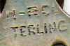 This bookmark is American made and is only marked H-RCO Sterling. It has an enamel picture of a rose at the top. Date is probably early 1930's.