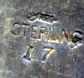 This bookmark was made in the US by William Kerr. It has  his famous hallmark on the back. The to is an angel or cherub.