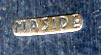 This bookmark was made in Spain and is marked Maside, which according to Wikipedia, is a municipality in Ourense (province) in the Galicia region of north-west Spain. The top is the head of a conquistador. The date is unknown.