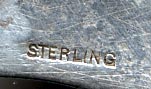 This is more of a letter opener than a bookmark but can be used as both. It was made in the US by an unknown manufacturer and is marked only sterling. The top is a highly detailed bust of Charles Dickens.