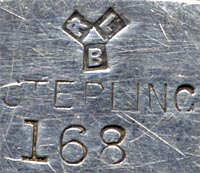 This bookmark was made in the US by Rogers, Lunt and Bowlen. It is marked with the manufacturers hallmark and  sterling and the number 168. The top is a figural bust of William Bryant (1794 - 1878), the poet and journalist.