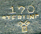 This bookmark was made in the US by Rogers, Lunt and Bowlen. It is marked with the manufacturers hallmark and sterling and the number 168. The top is a figural rabbit.