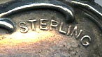 This bookmark was made in the US by Webster Co. It is marked Sterling and the makers hallmark. It was made in 1913 and was originally sold as a letter opener.