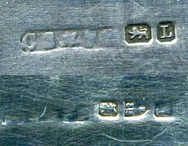 This bookmark was made in Chester, England in 1894 by Cornelius Saunders &amp; Francis Shepard. It probably had a magnifying glass at one time. This is almost identical to bookmark 1094 except for the material.