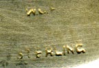 This bookmark was made in the US by W.C. Finck. It is marked sterling and a rubbed out manufacturers mark. The letter E surrounded by a wreath of very detailed flowers is the symbol of the United Society of Christian Endeavor. It is finished in a gold wash. 