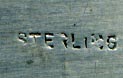 This bookmark was made in the US by an unknown manufacturer. Marked only sterling on the back, it is in the shape of a knife with a rope and flower handle.