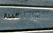 This bookmark was made in Birmingham England by Adie and Lovekin. It has the date mark of g for 1906. The top is a beautiful enamel butterfly.
