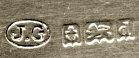 This bookmark was made in England and has the sterling hallmarks for Birmingham 1903. It is in the shape of a trowel with a crested handle from Glastonbury Abbey.