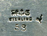 This bookmark was made in the US by Gorham. It is marked with the Gorham hallmark and Sterling and 53. The top is a blooming flower in a container. The very top has a shell motif. This is from the Autumn 1888 Gorham catalog where they sold 33 different bookmarks. The year mark on this particular piece is a rooster indicating 1890. 