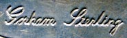 This bookmark was made in the US by Gorham. It is marked Sterling Gorham. The shape is a corner and has the picture of either a leaf or a tree. It was a promotional bookmark made for George Watts & Sons.