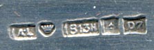This bookmark was made in Finland. It is marked for the year 1957 and 813H indicating a silver content of .830. The top is an enamel coat of arms for the town and former municipality of Ekenäs which has merged with Pohja and Karis to form the new municipality of Raseborg on January 1, 2009.