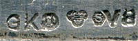 This bookmark was made in Sweden. It has hallmarks GK a city mark for Stockholm, 3 crowns, S and V 8 for the year 1947. The top has a Buddha, an interesting subject for Sweden. 
