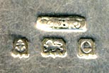 This bookmark was made in Birmingham England by an unknown manufacturer with the hallmark of B.H.J. It has the date mark of e indicating 1904. The top is a figural Lincolnshire Imp, seen in the Angel Choir at Lincoln Cathedral.