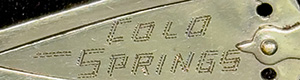 This bookmark was made in the US. It is a masonic piece in the shape of a trowel with a goldstone handle. The date is sometime in the 1950s when goldstone was very popular.