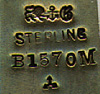 This bookmark was manufactured in the US by Gorham. It is finished in a gold plate or wash over sterling. It has a cherub and a heart on the top and the blade is inscribed Oct 14 '98. It is marked with the Gorham hallmark, Sterling, B1570M and the year hallmark for 1898.