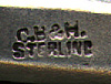 This bookmark is American made by Codding Bros. & Heilborn. It is marked CB & H. Sterling. The date is 1897 - 1918.