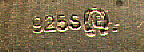 This bookmark is made in Norway. It has 925S and a hallmark on the front blade. The top is of a Norse ship done in enamel and the word NORGE underneath it. The date is unknown.